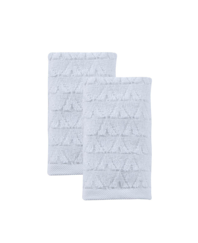 Set of two white Turkish hand towels with geometric pattern, folded and layered