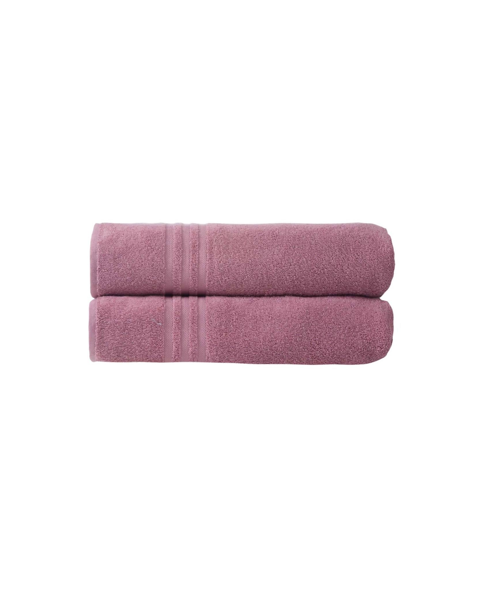 Pair of pink bath sheets stacked with terry loops and double horizontal stripe detail