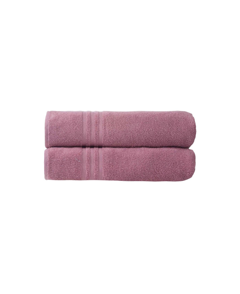 Pair of pink bath sheets stacked with terry loops and double horizontal stripe detail