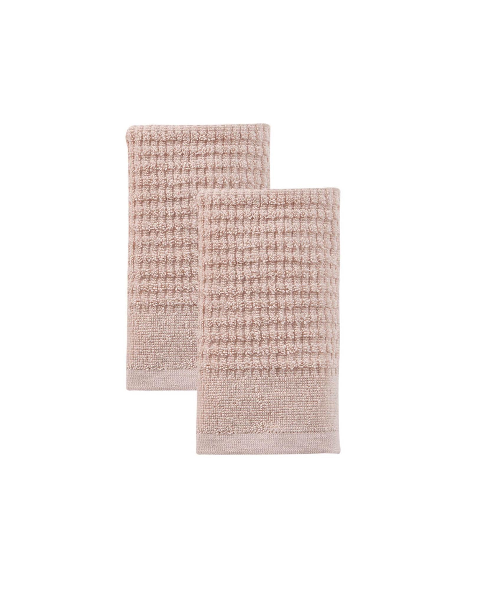 Set of two pink Turkish cotton hand towels, textured waffle weave, neatly folded