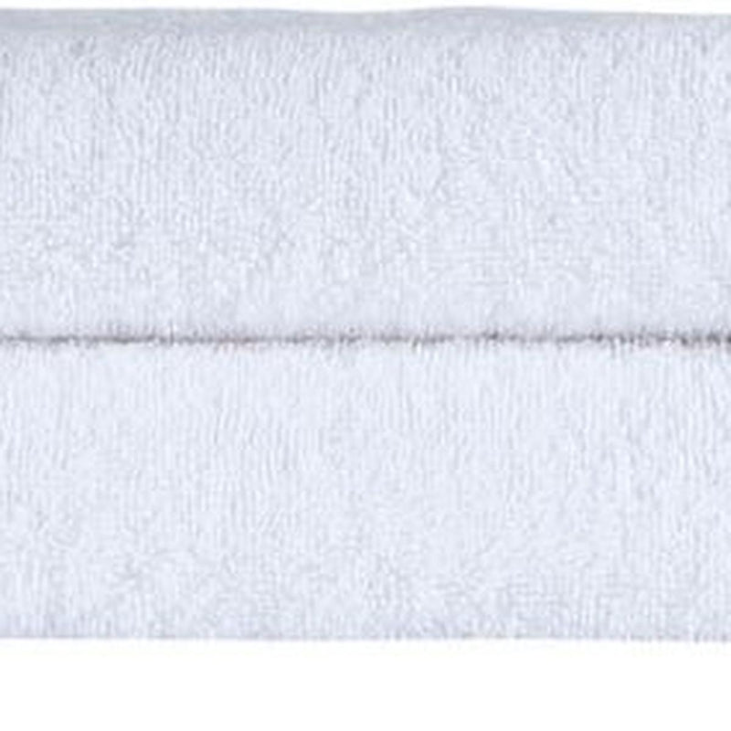 White Turkish cotton bath towel with textured looped surface and plain hem
