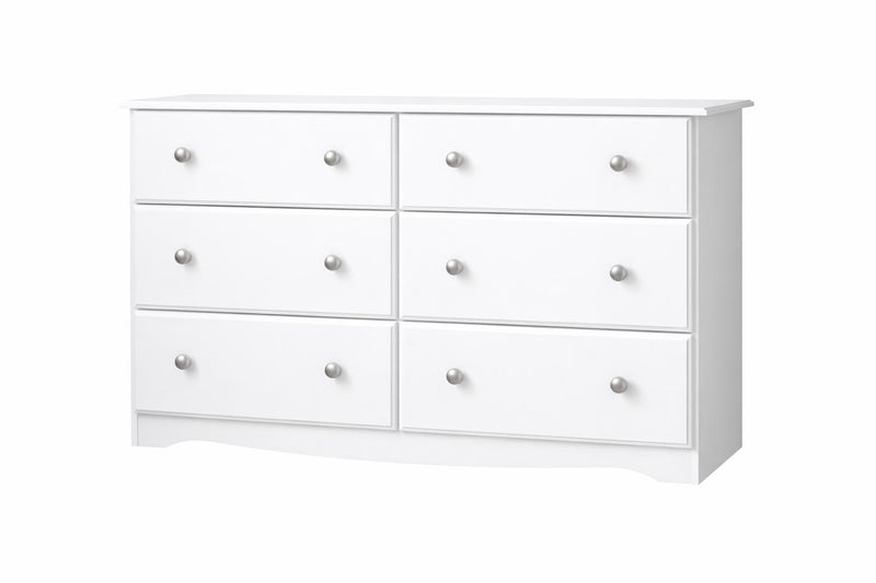 White six-drawer dresser with three drawer pairs and round silver hardware, side view