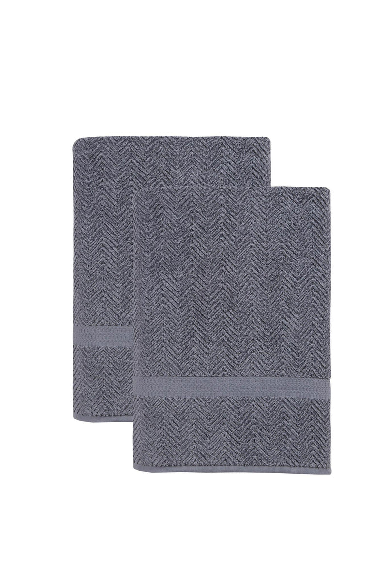 Two light gray chevron Turkish cotton bath sheets, stacked and folded