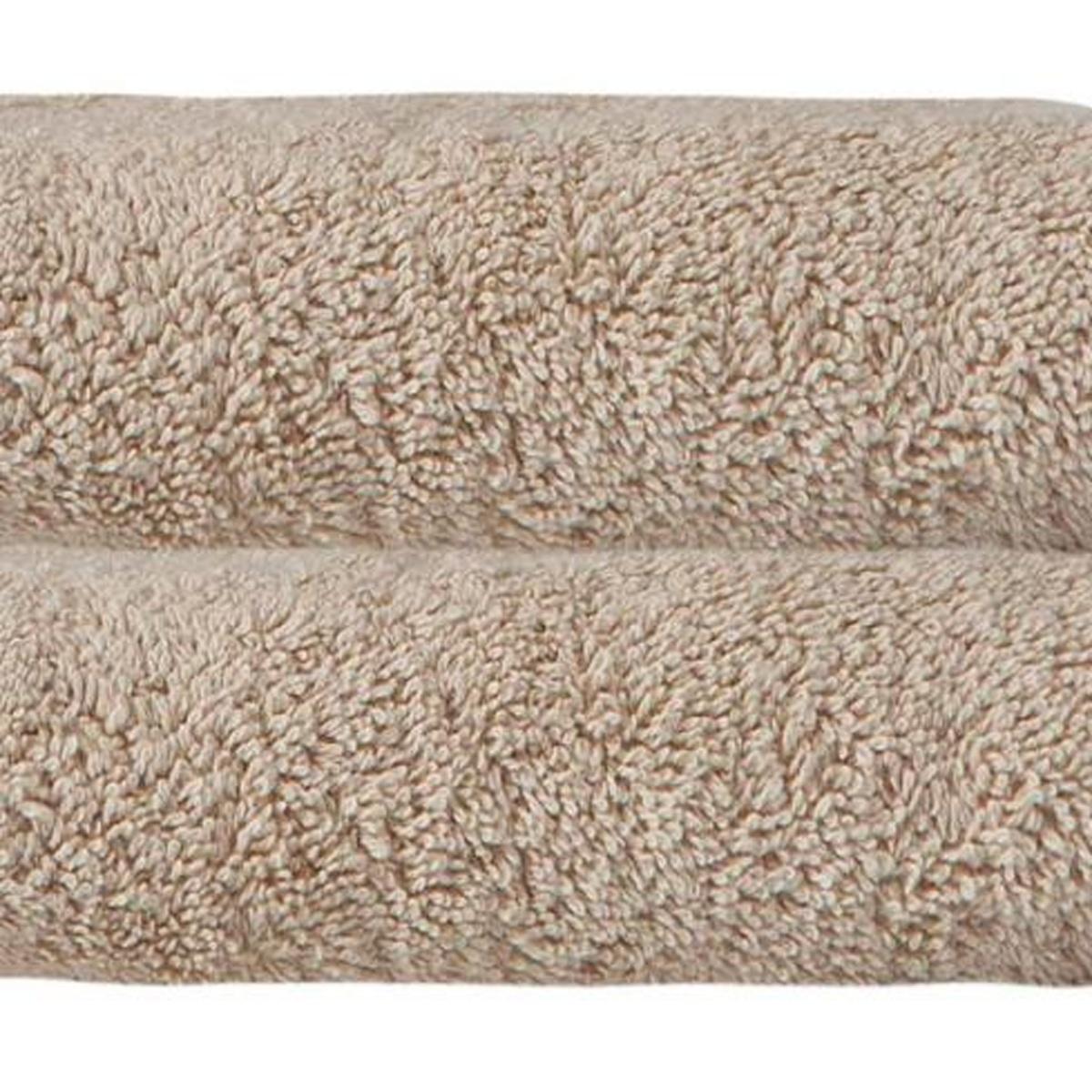 Beige Turkish cotton hand towel set, close-up of looped terry texture