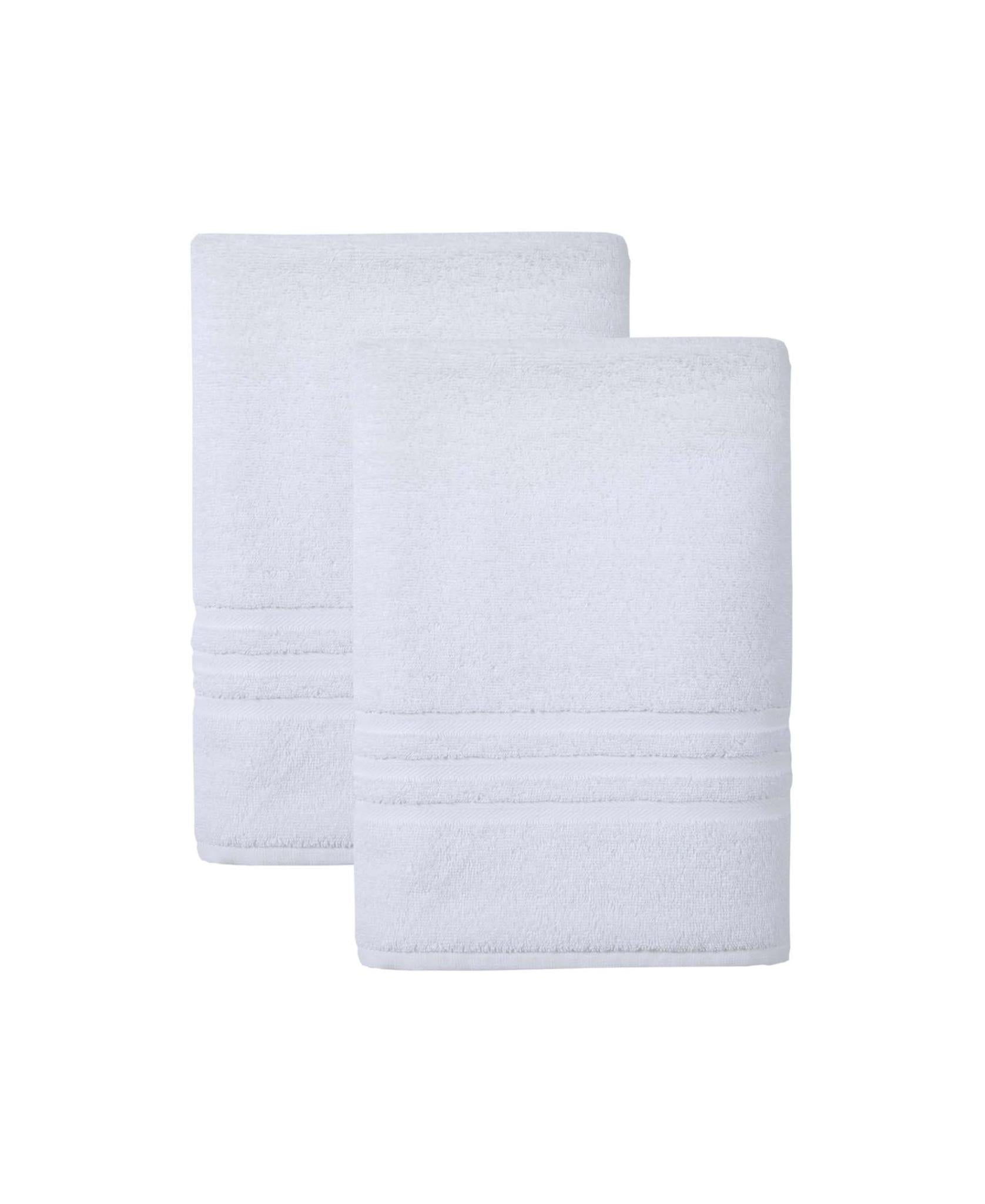 Set of two white Turkish cotton bath towels, folded with visible striped border