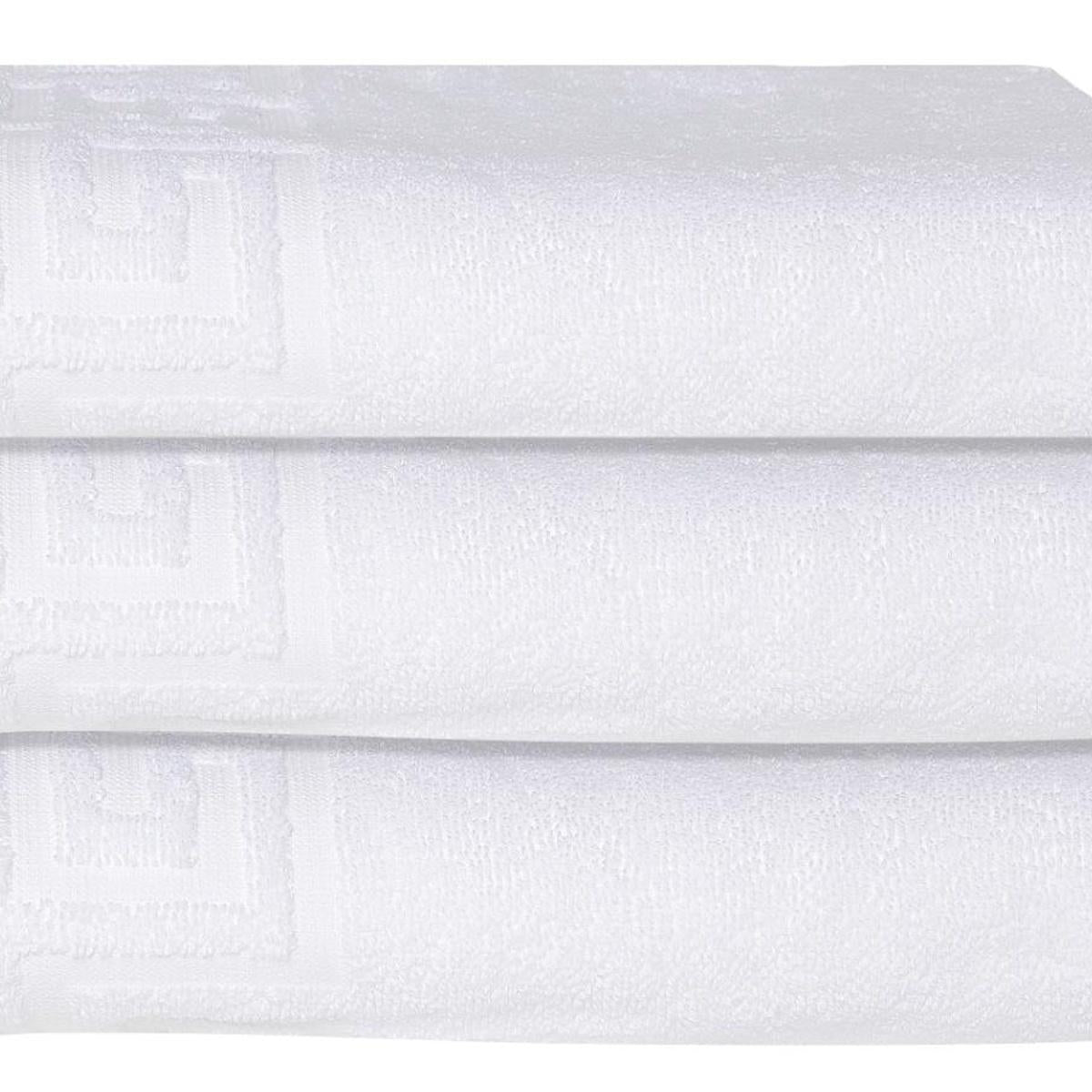 White Turkish cotton bath towel close-up of Greek key pattern across end border