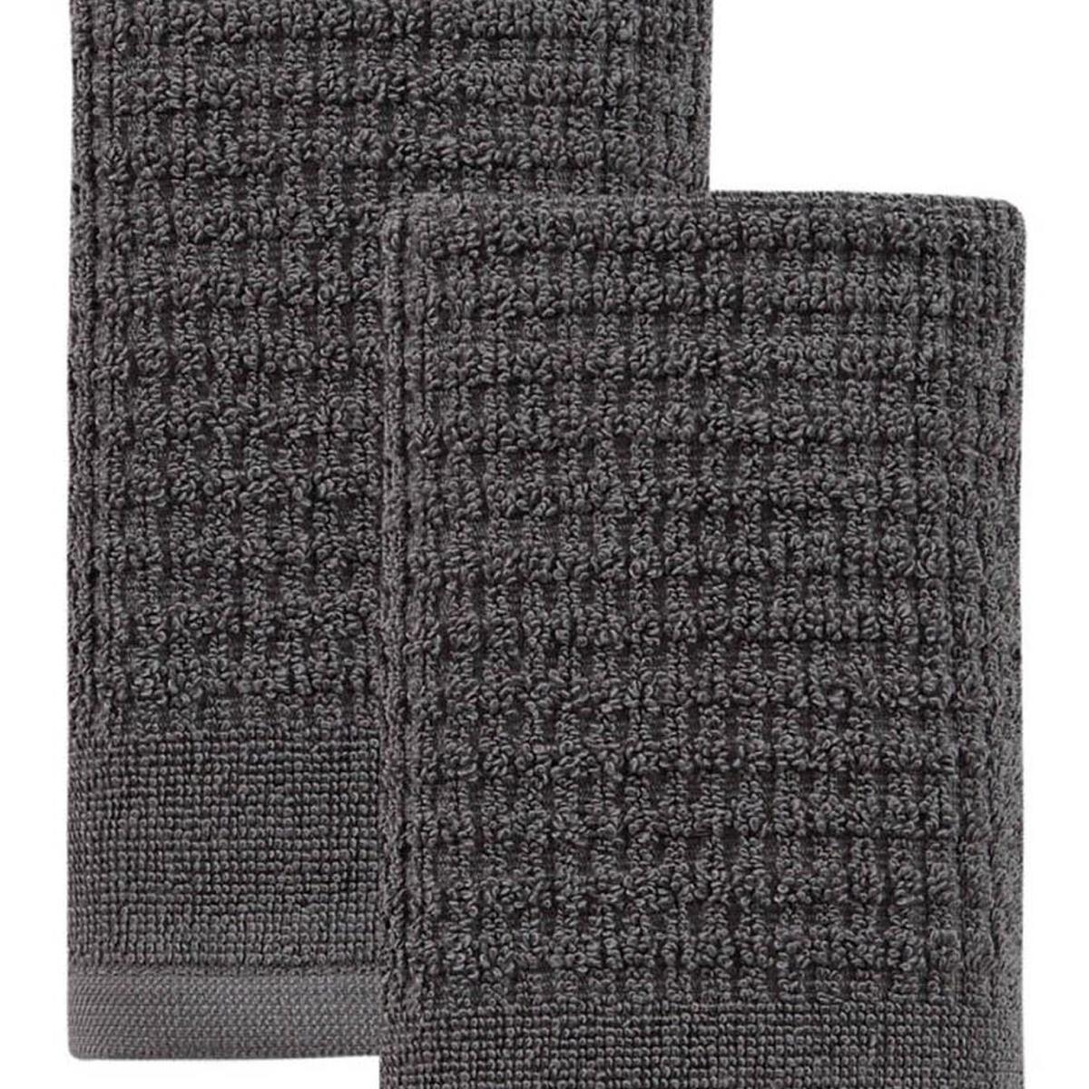 Two dark gray Turkish cotton towels, close-up textured polka dot weave