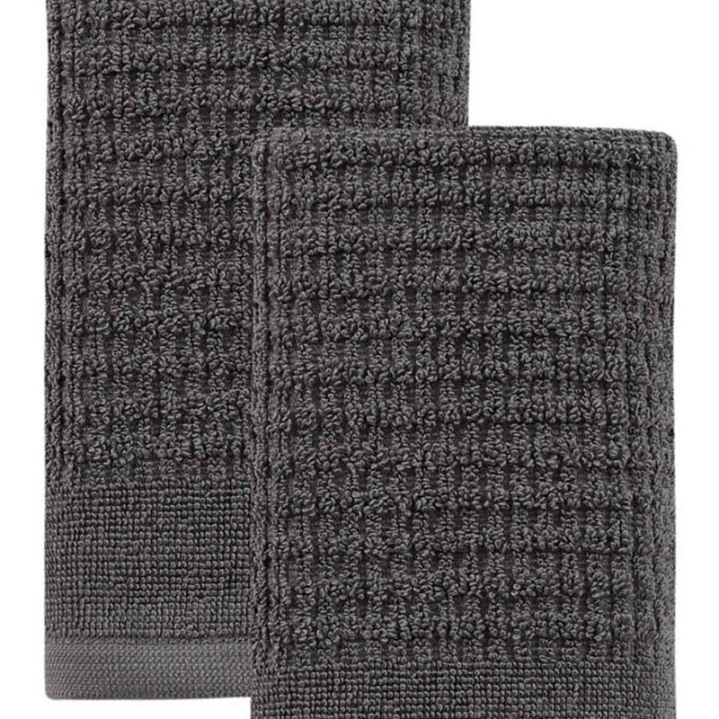 Two dark gray Turkish cotton towels, close-up textured polka dot weave