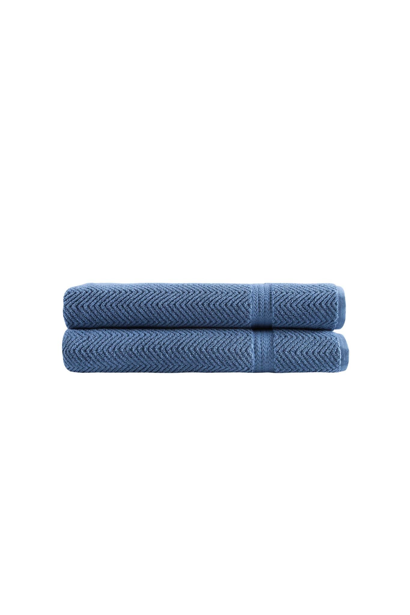 Stacked navy chevron bath sheets, folded Turkish cotton towels