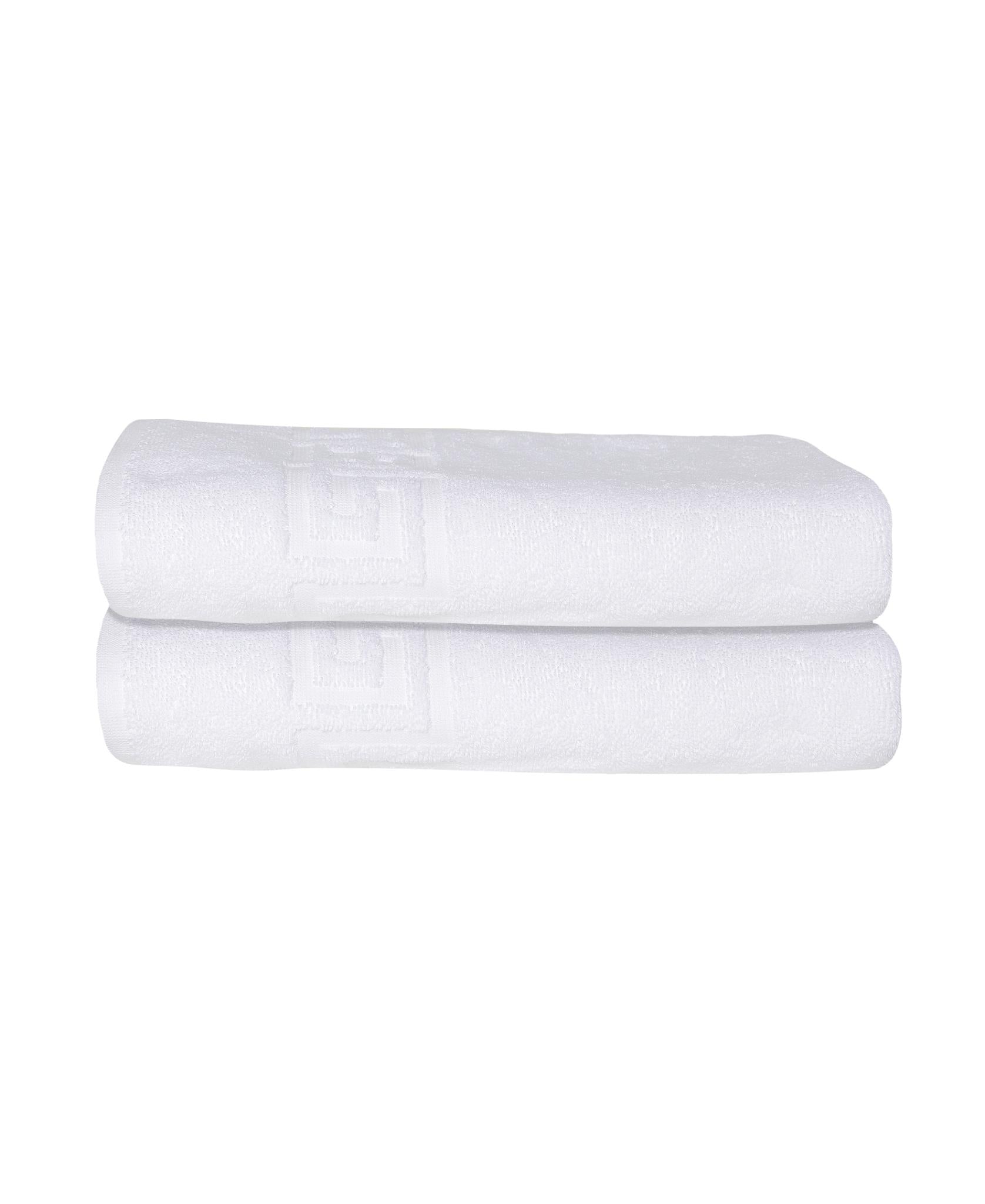 Set of two white bath towels with Greek key stripe, neatly folded