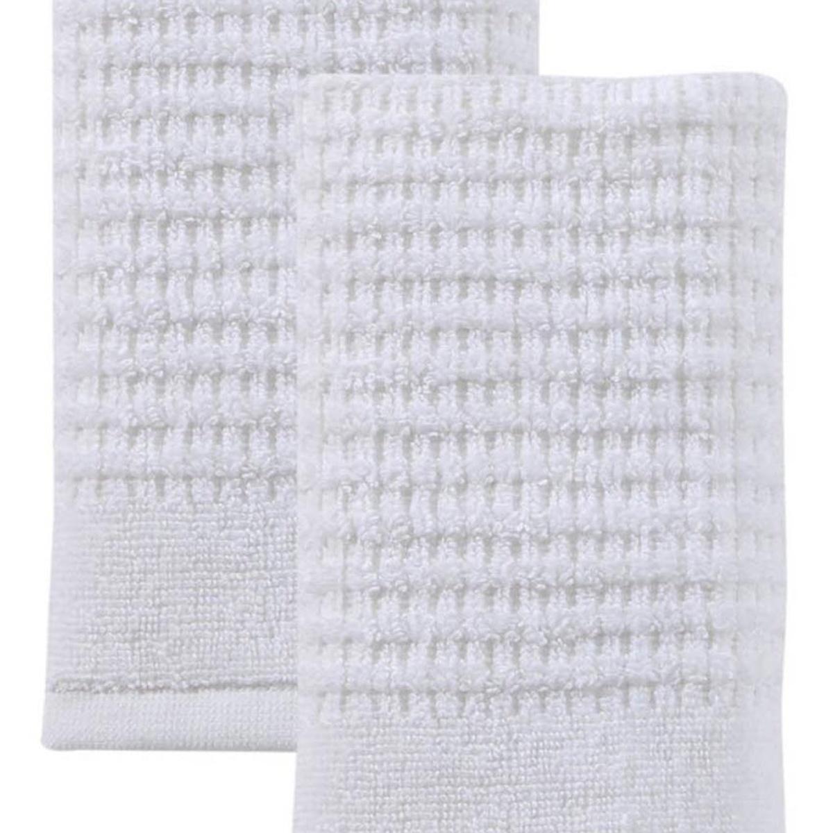 Set of two white Turkish cotton hand towels with small dotted waffle texture, one folded over
