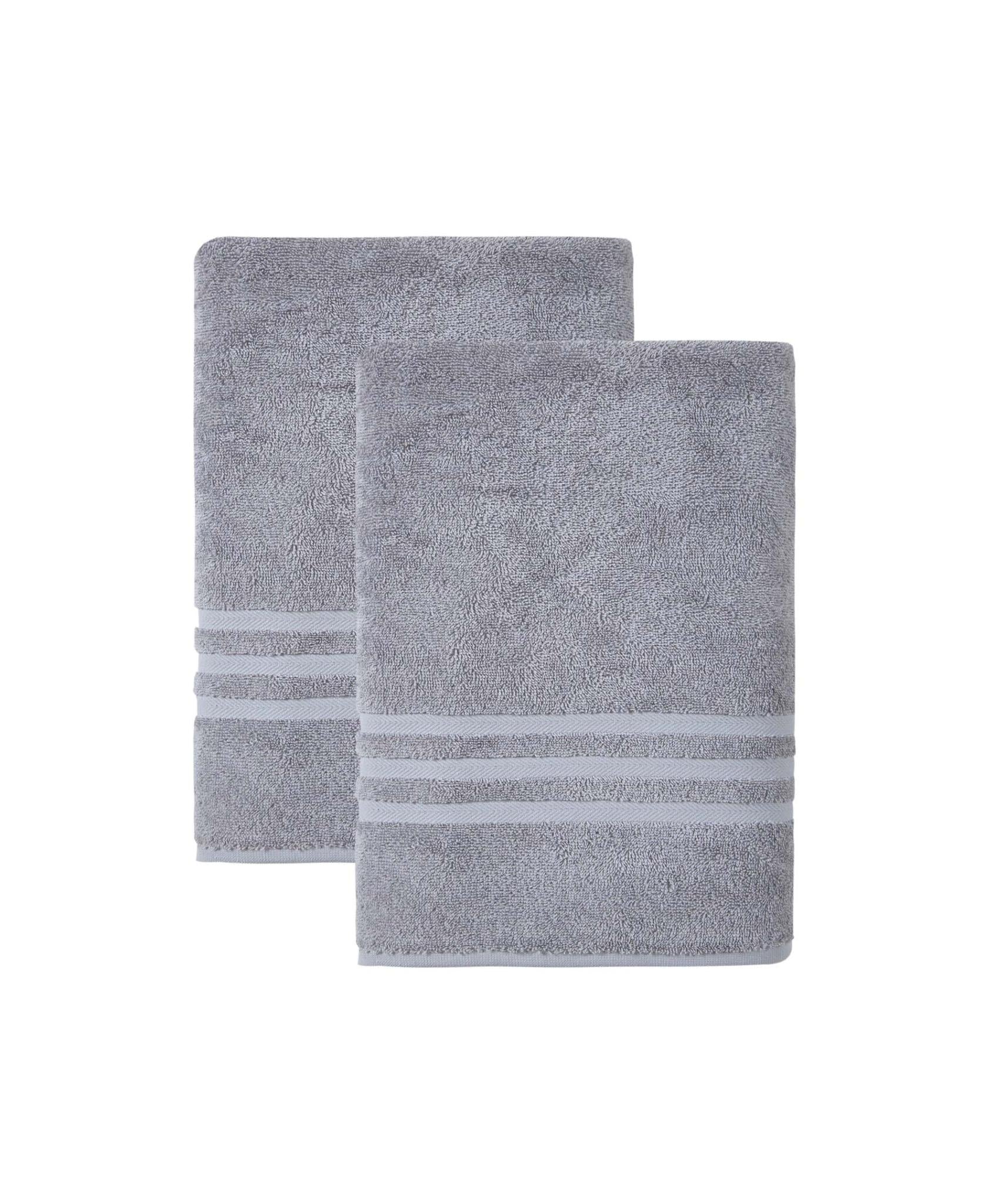 Set of two light gray bath towels, neatly folded, featuring horizontal striped bands.