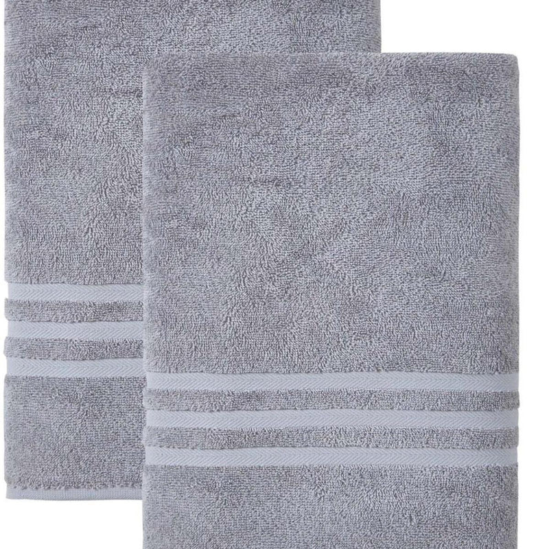 Stacked light gray bath towels set of two, with textured looped fabric and stripes.