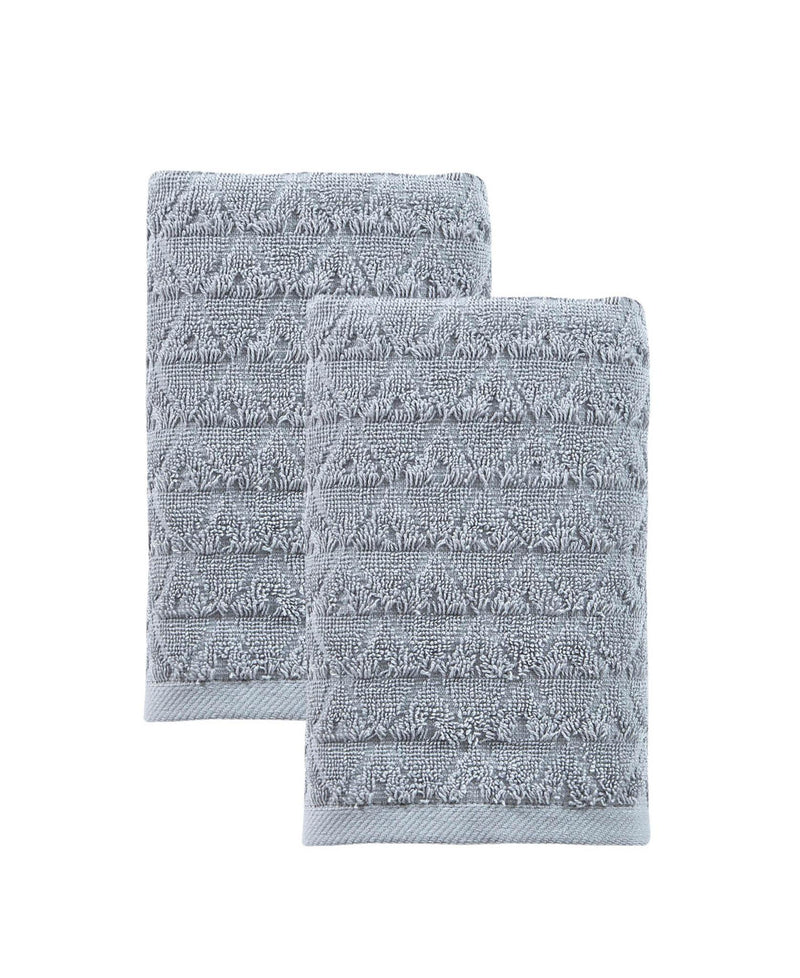 Set of two light gray bath towels with geometric texture, folded and stacked