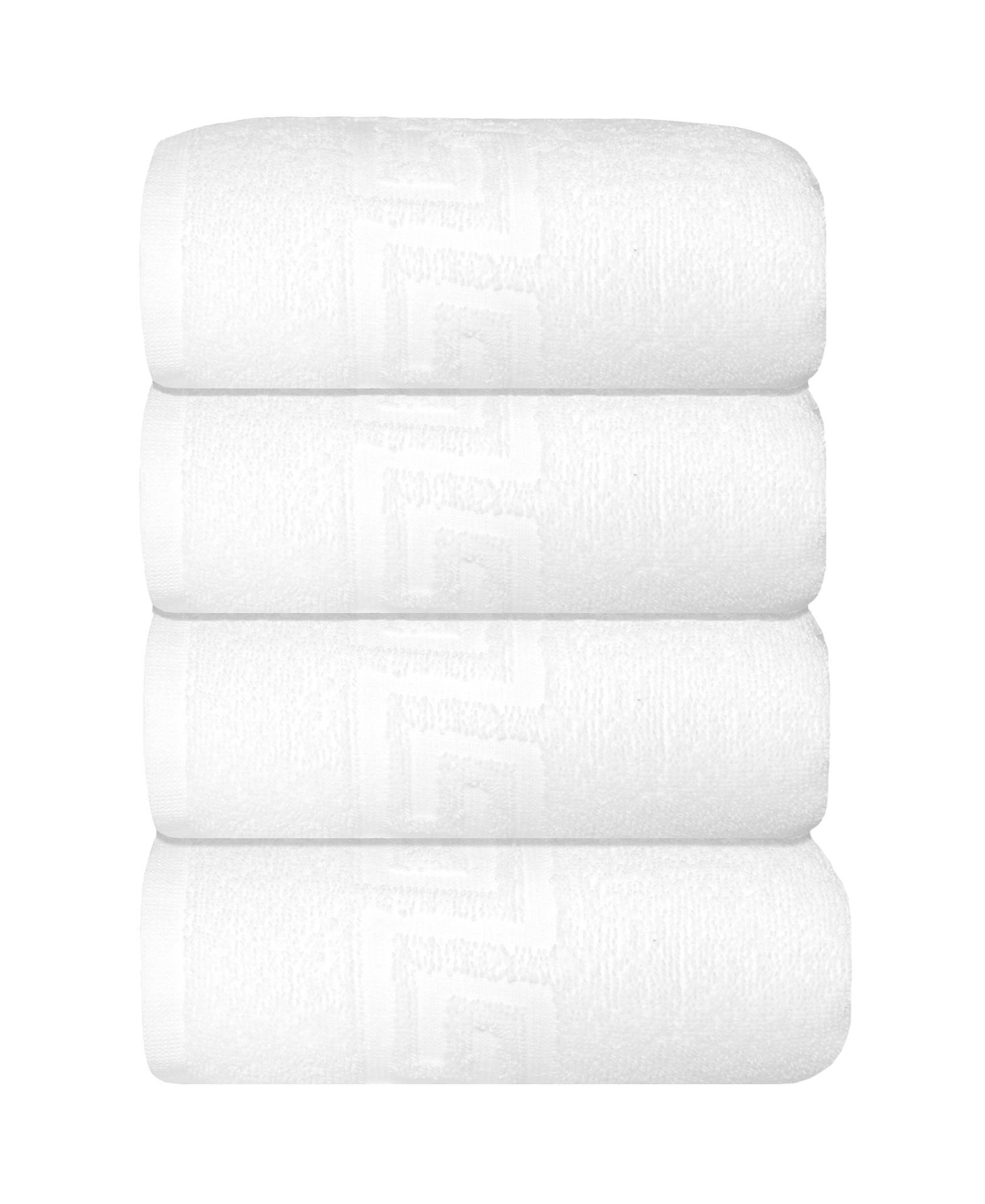 Set of four white Turkish cotton hand towels, folded