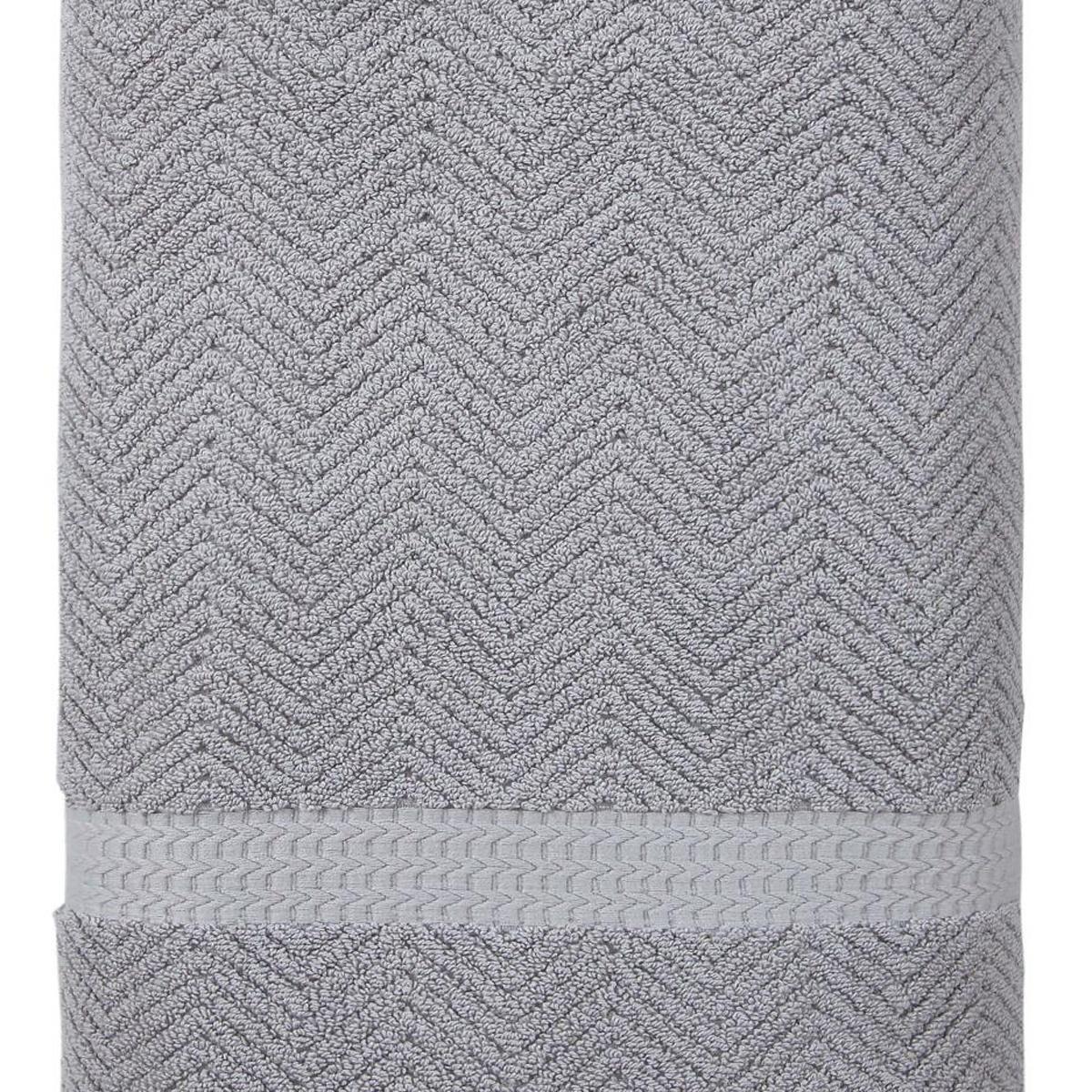 Gray Turkish cotton bath towel with chevron weave, folded with stitched border band