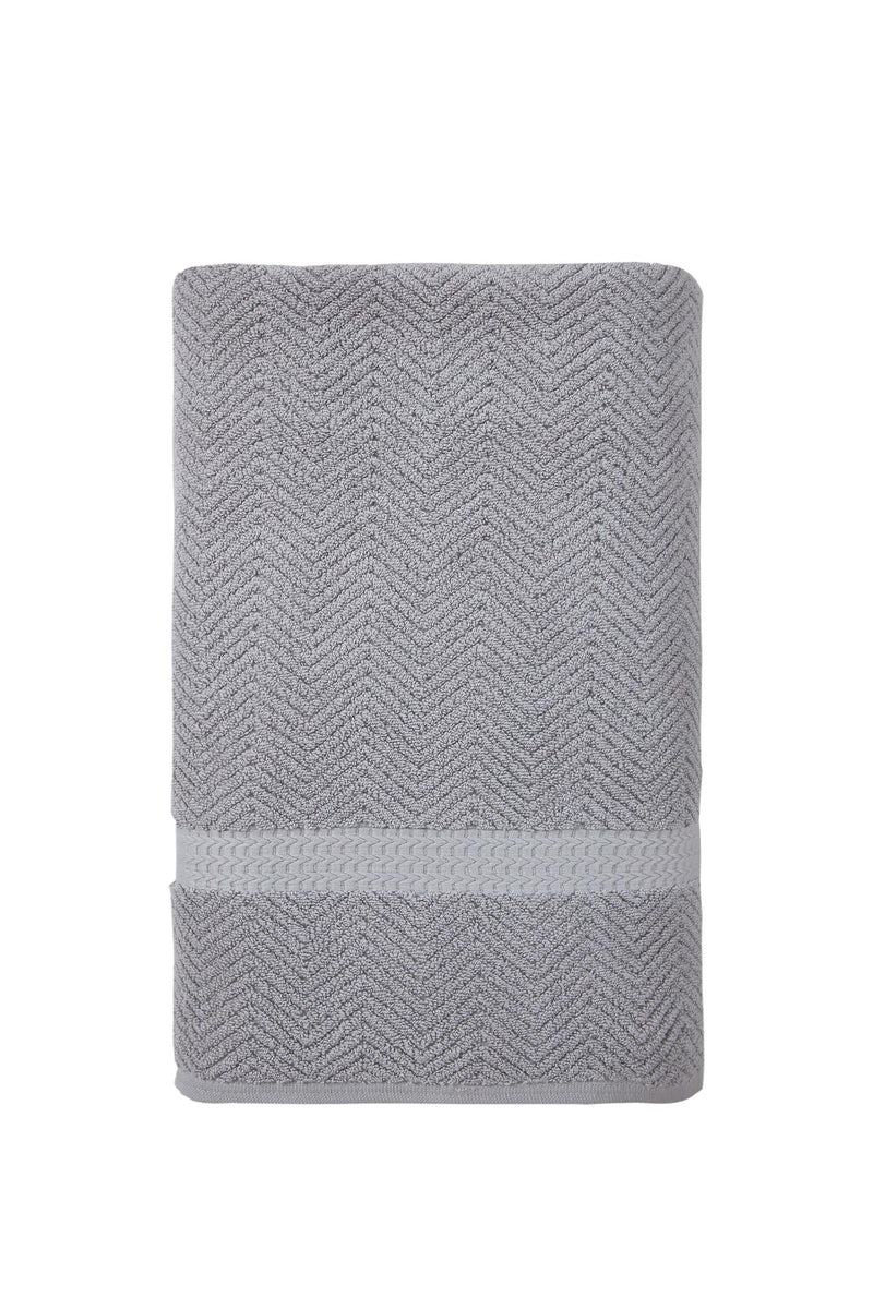 Gray Turkish cotton bath towel, rolled bundle with chevron texture and border band