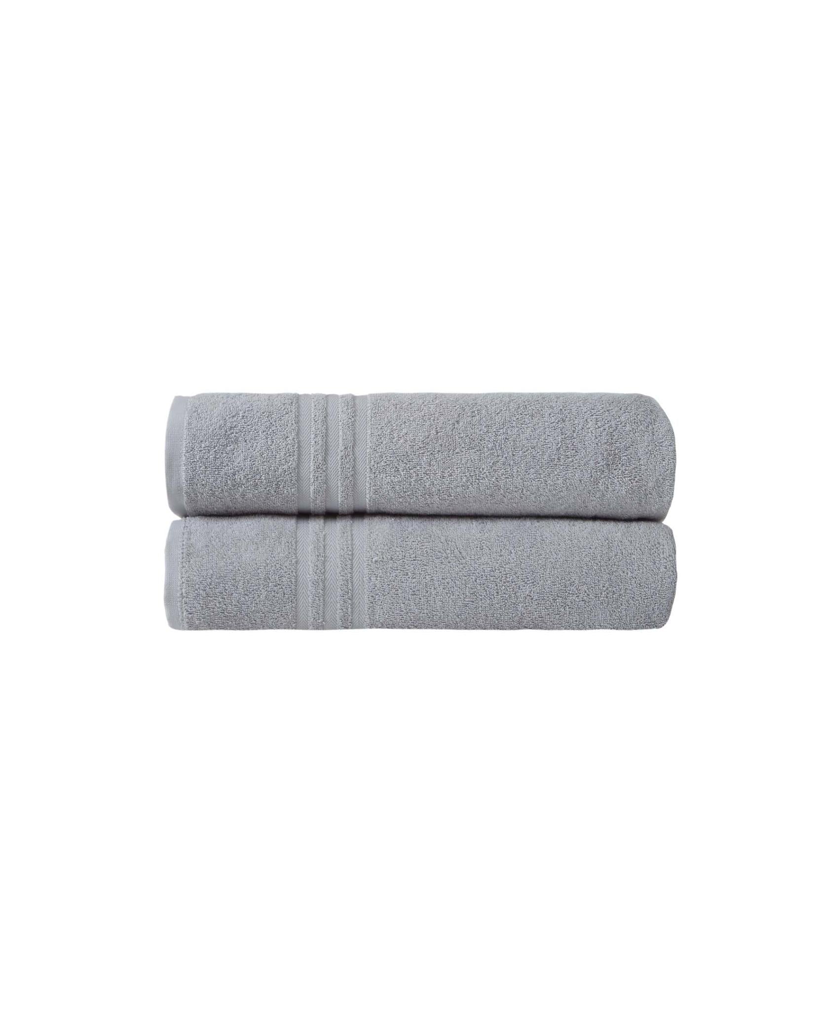 Light gray Turkish cotton bath towels set of two, neatly rolled and stacked