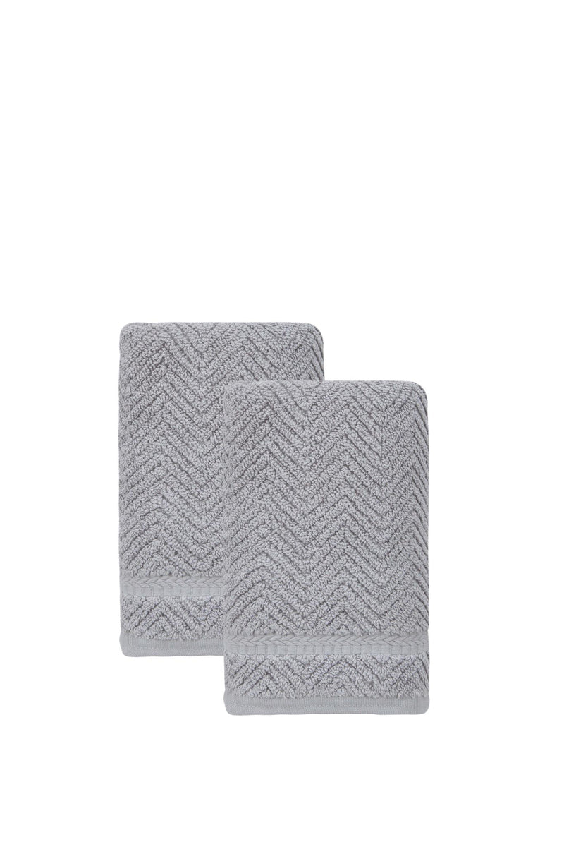 Set of two light gray chevron hand towels, one towel over the other