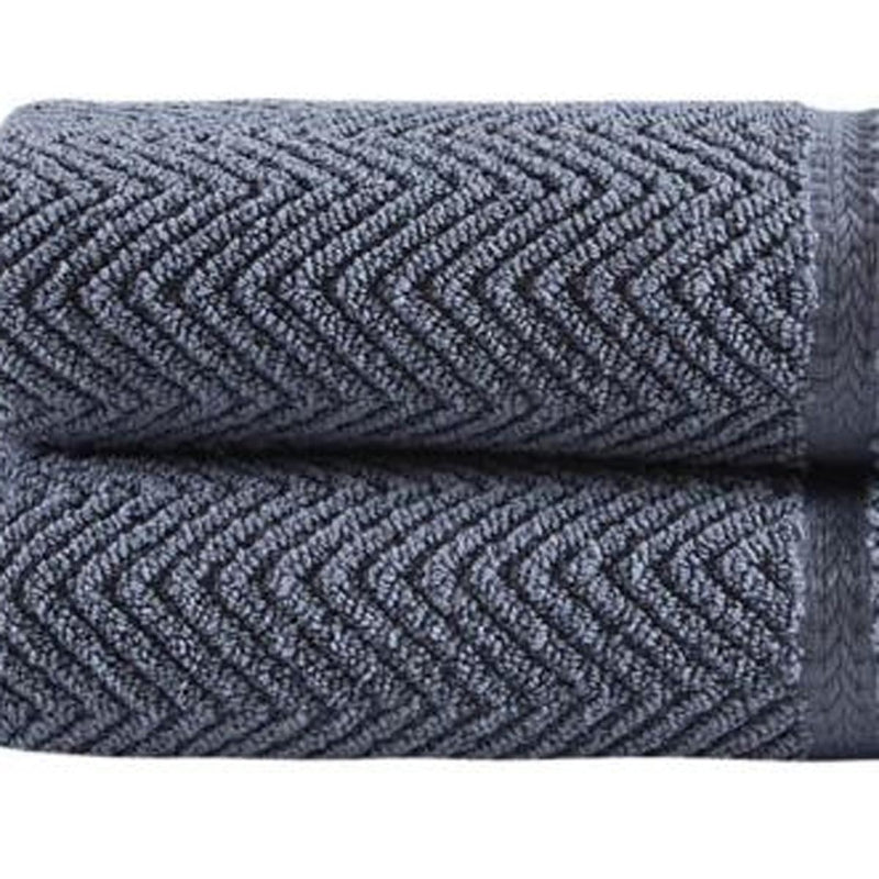 Set of two dark gray chevron Turkish cotton hand towels with stitched edge, close-up