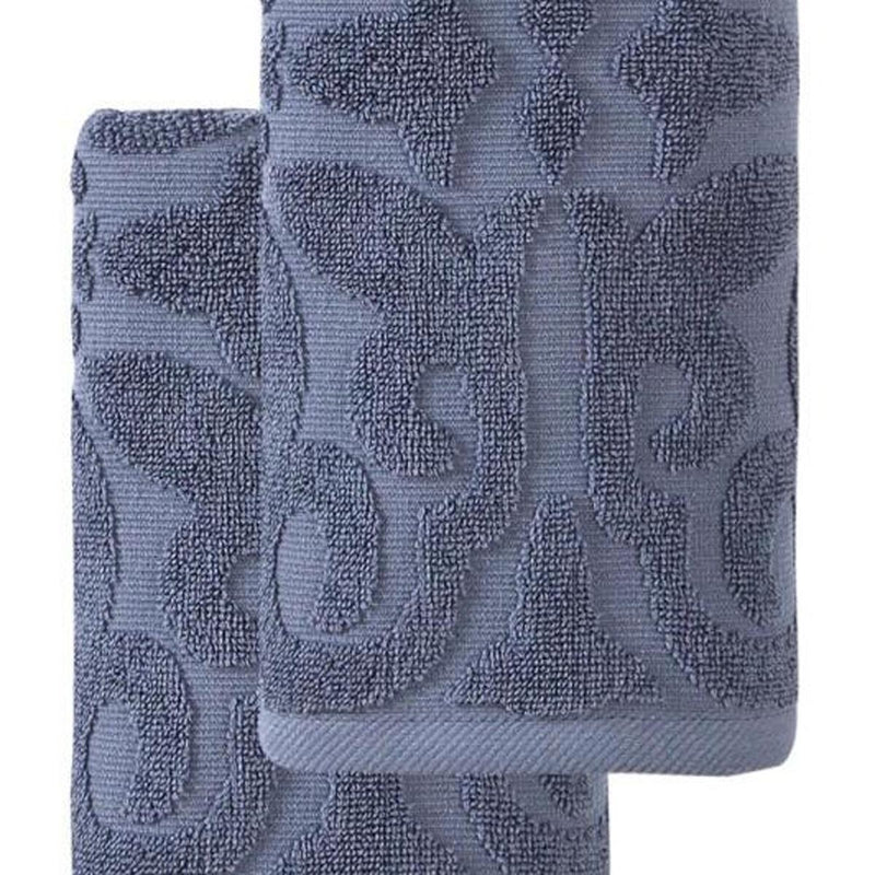 Navy blue floral Turkish cotton hand towel, textured loop pile, folded corner