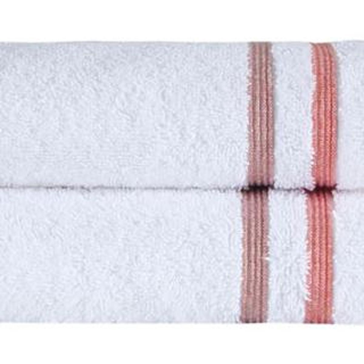 White terry hand towel with terracotta striped border, close-up texture and edge