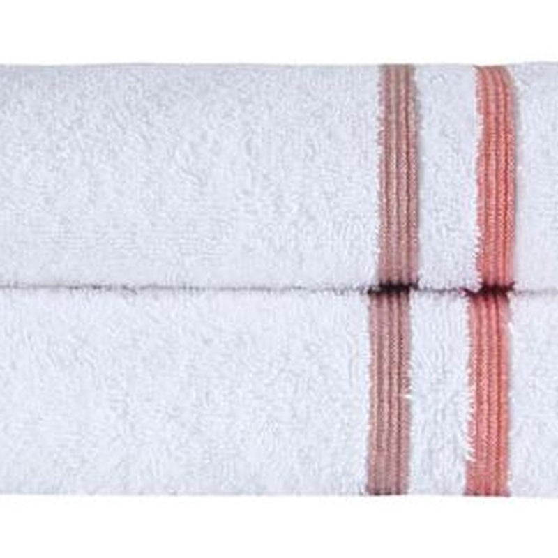 White hand towel edge with terracotta vertical stripe trim, textured terry pile