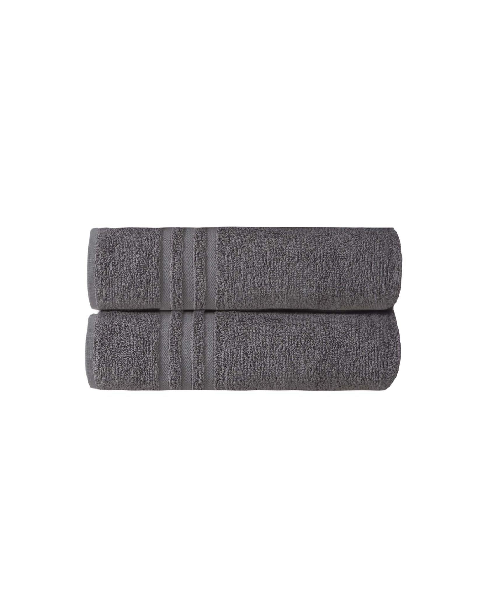 Set of two dark gray bath towels, rolled with center striped bands