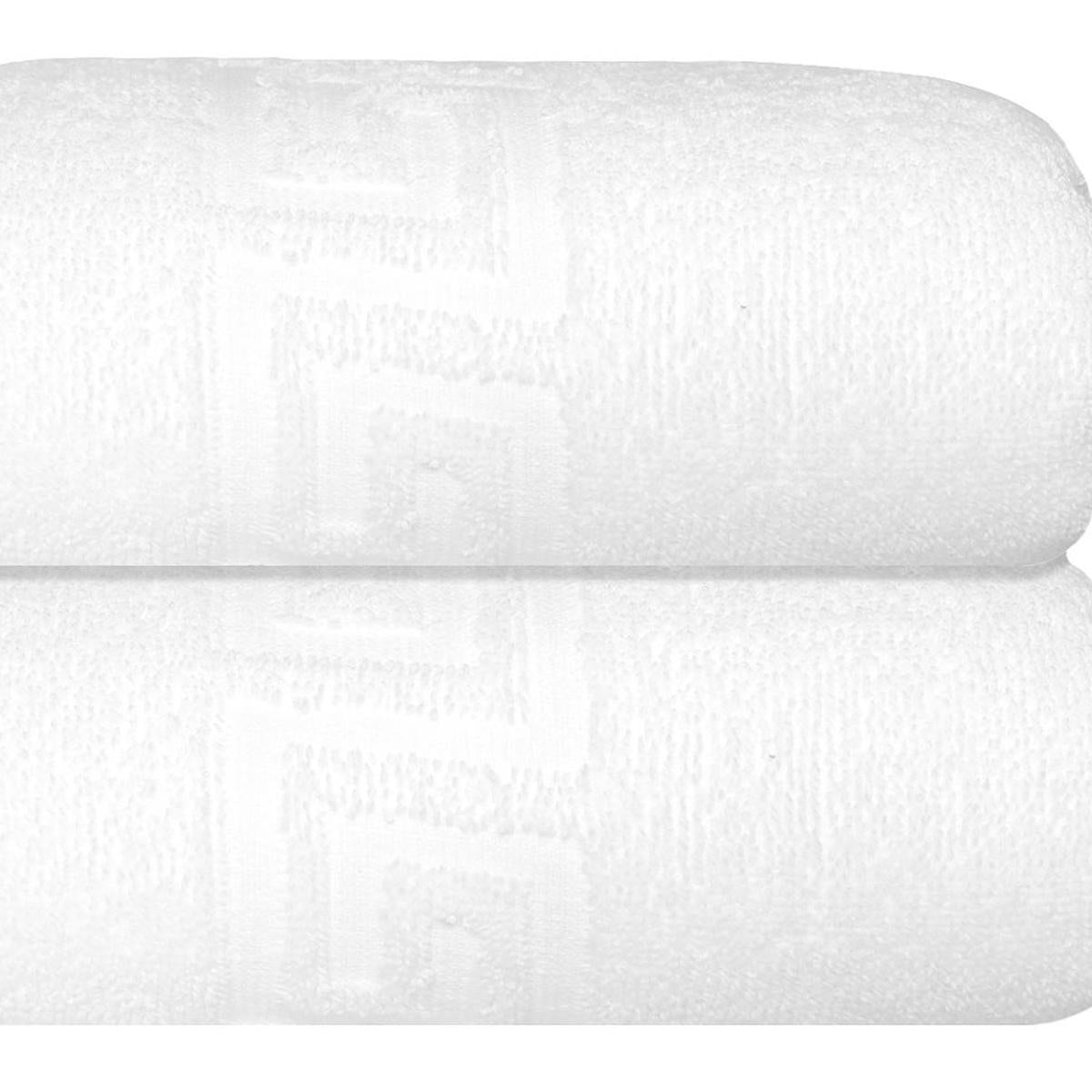 White Turkish cotton hand towel close-up with Greek key border on fold