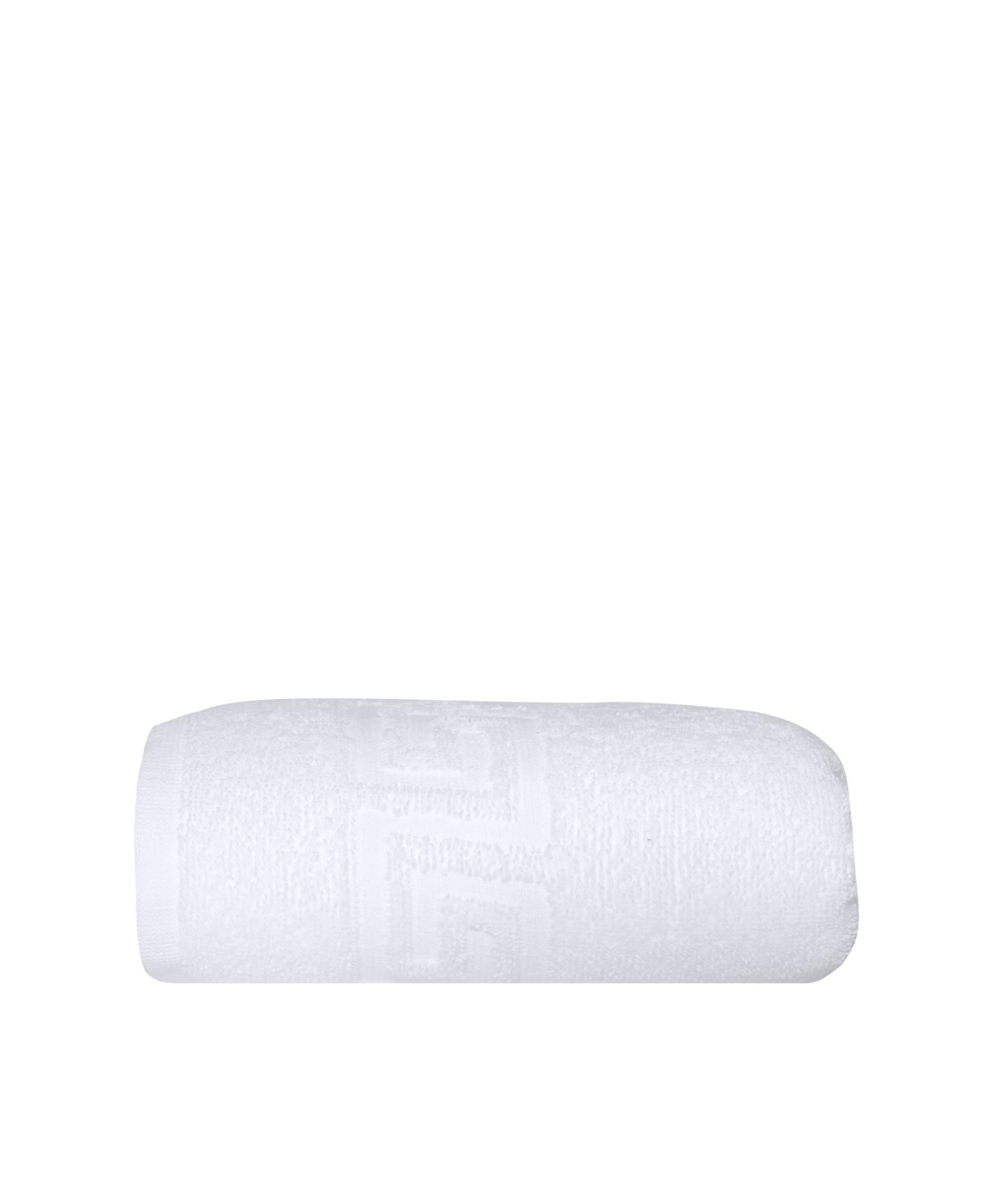 White Turkish cotton hand towel, rolled, with Greek key pattern detail