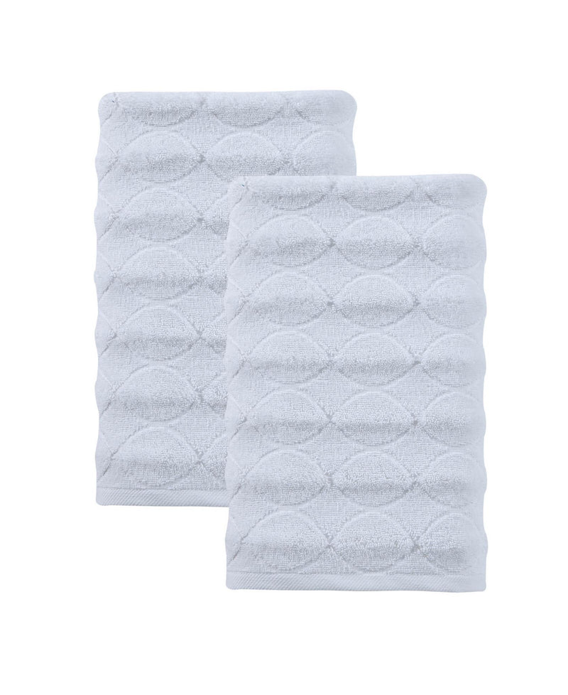 White bath towels with geometric diamond pattern, two pieces folded