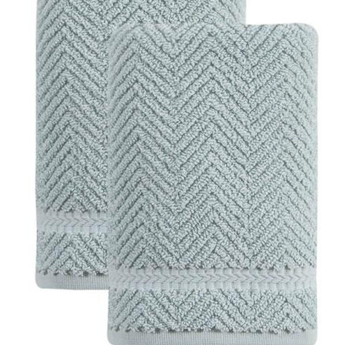 Aqua chevron Turkish cotton towel with zigzag texture, close-up fold