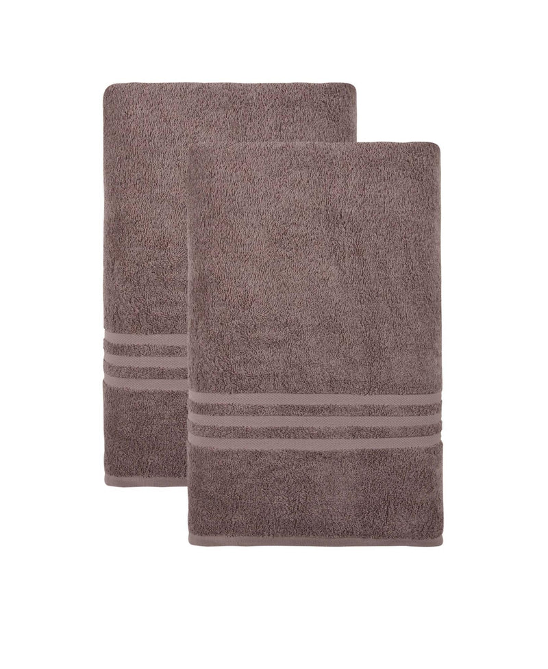 Two mauve bath towels stacked, textured terry loops with horizontal striped bands
