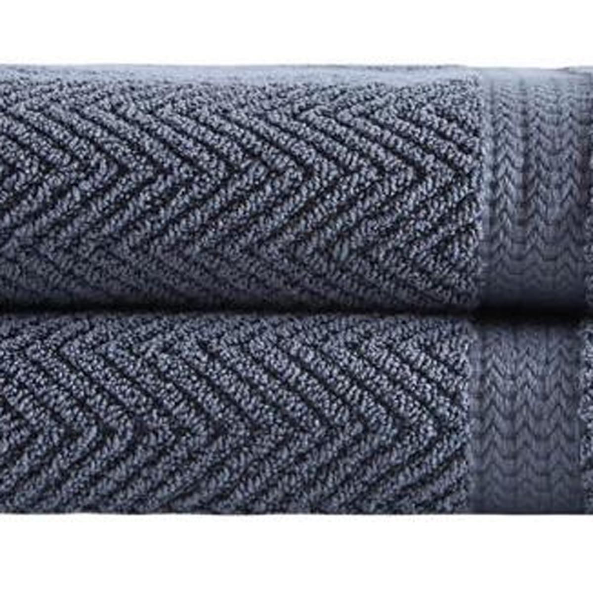 Light gray chevron Turkish cotton bath towels, folded with textured pattern close-up