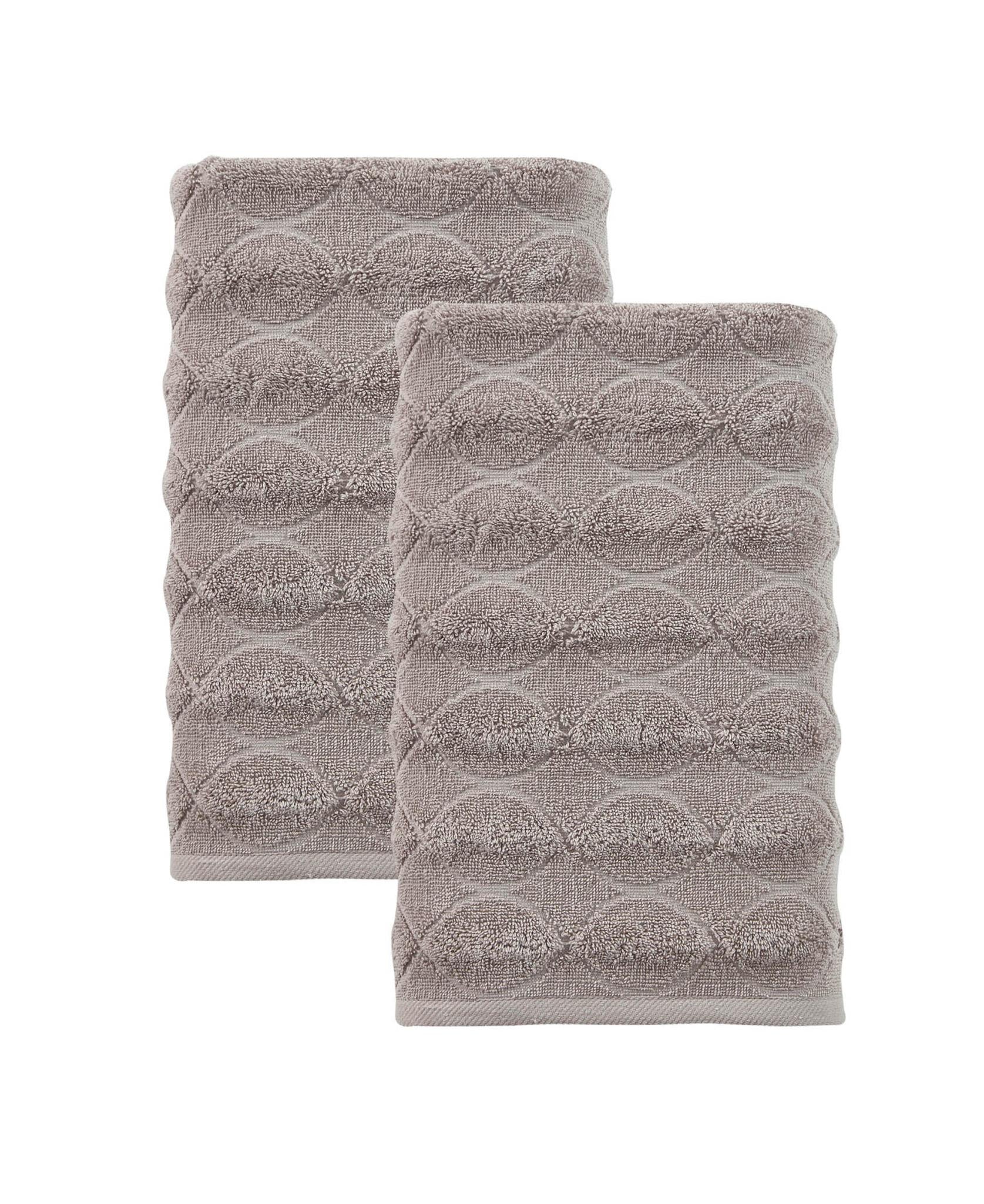 Set of two bath towels, light brown with circular geometric texture, stacked