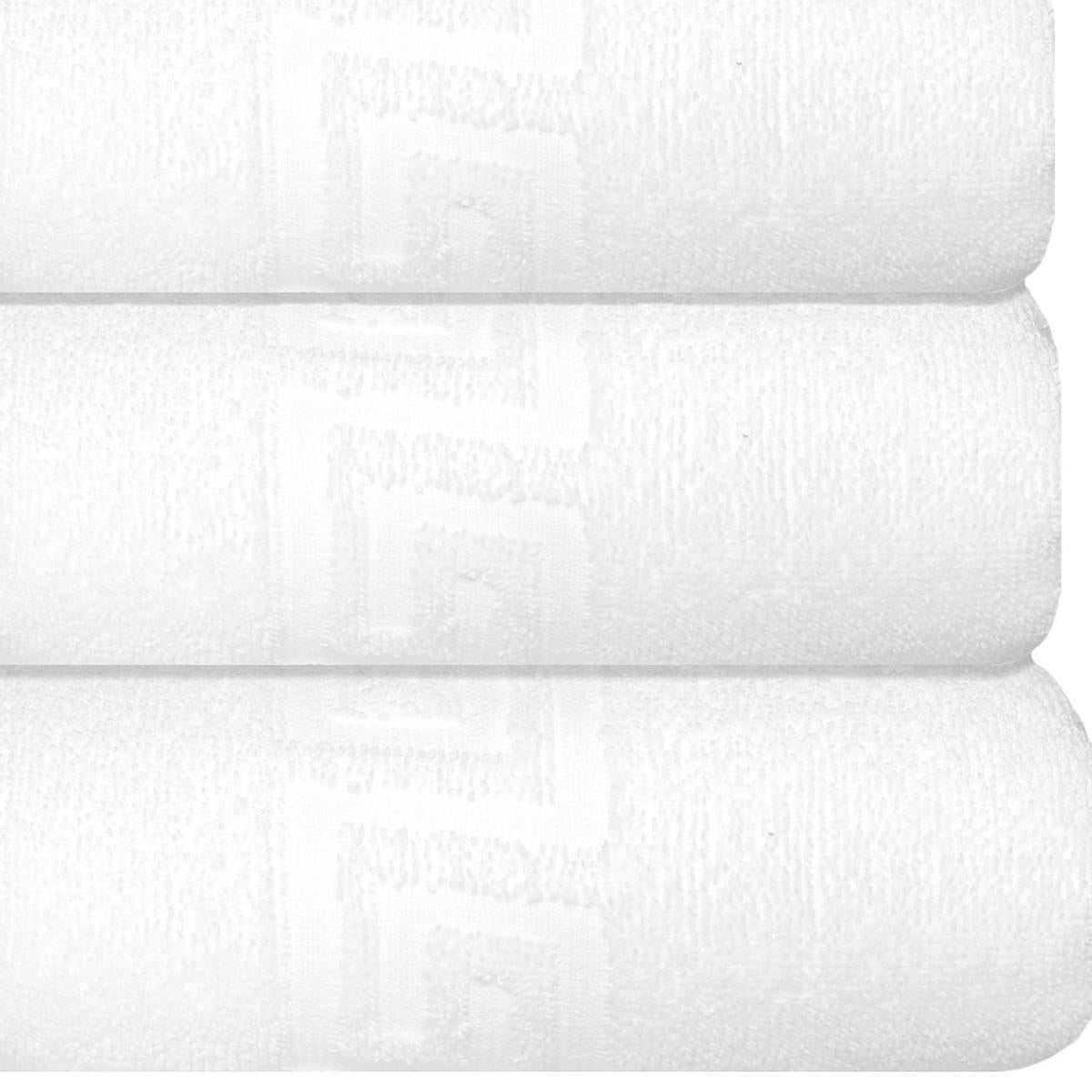 Set of three white Turkish hand towels, textured pile with Greek key pattern detail