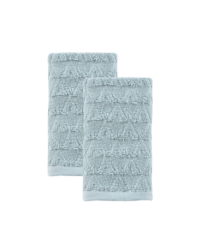 Set of two aqua Turkish hand towels, overlapping folds, textured geometric design.