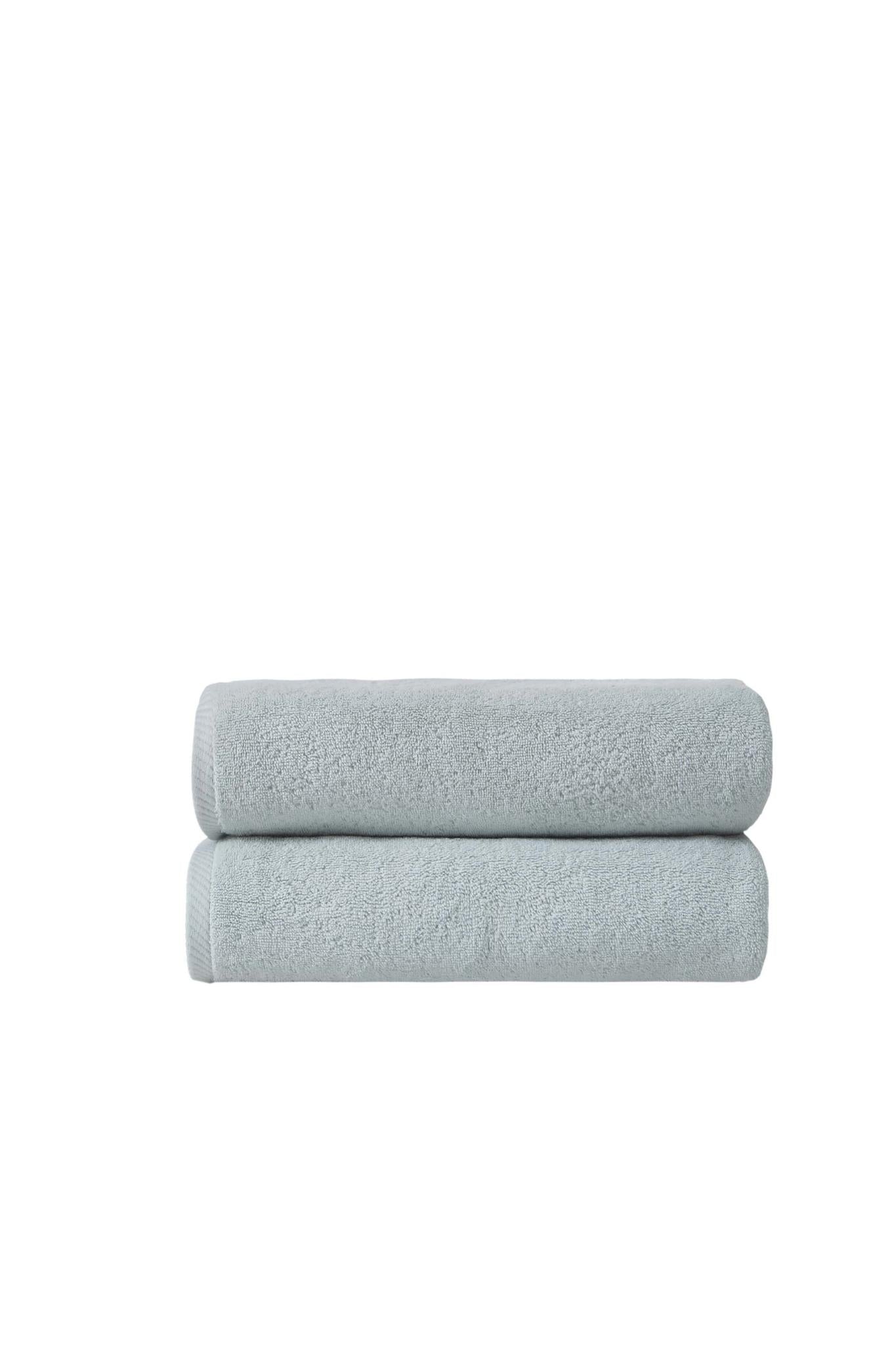 Set of two aqua bath towels, textured Turkish cotton, neatly rolled pair