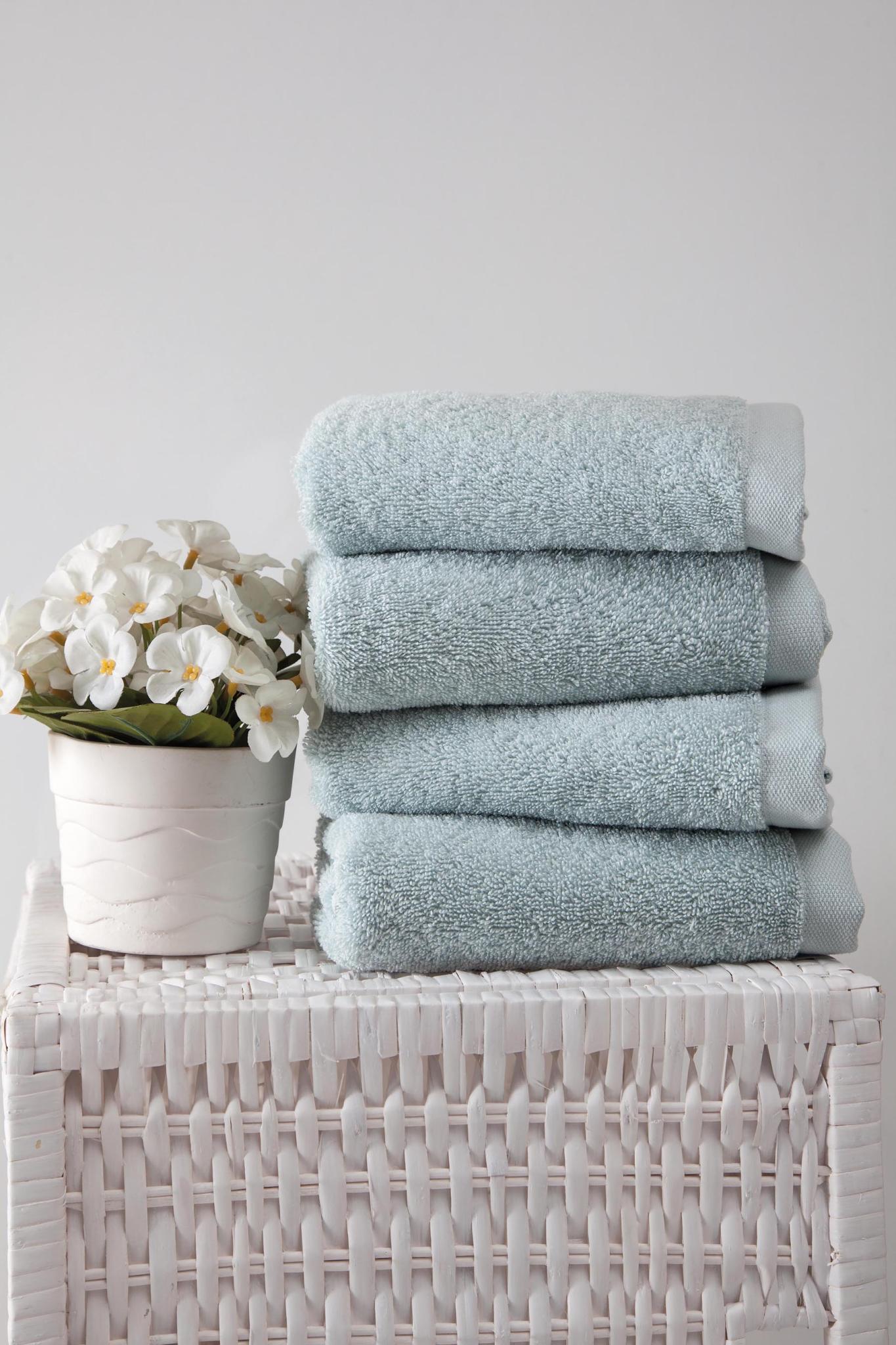 Turkish cotton hand towels, folded, light teal-green, set of four