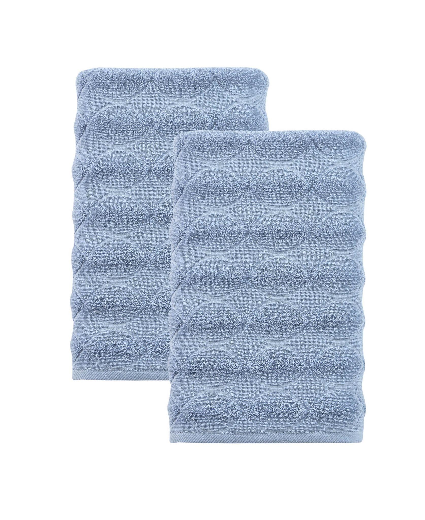 Two navy blue Turkish cotton bath towels with geometric pattern, stacked pair
