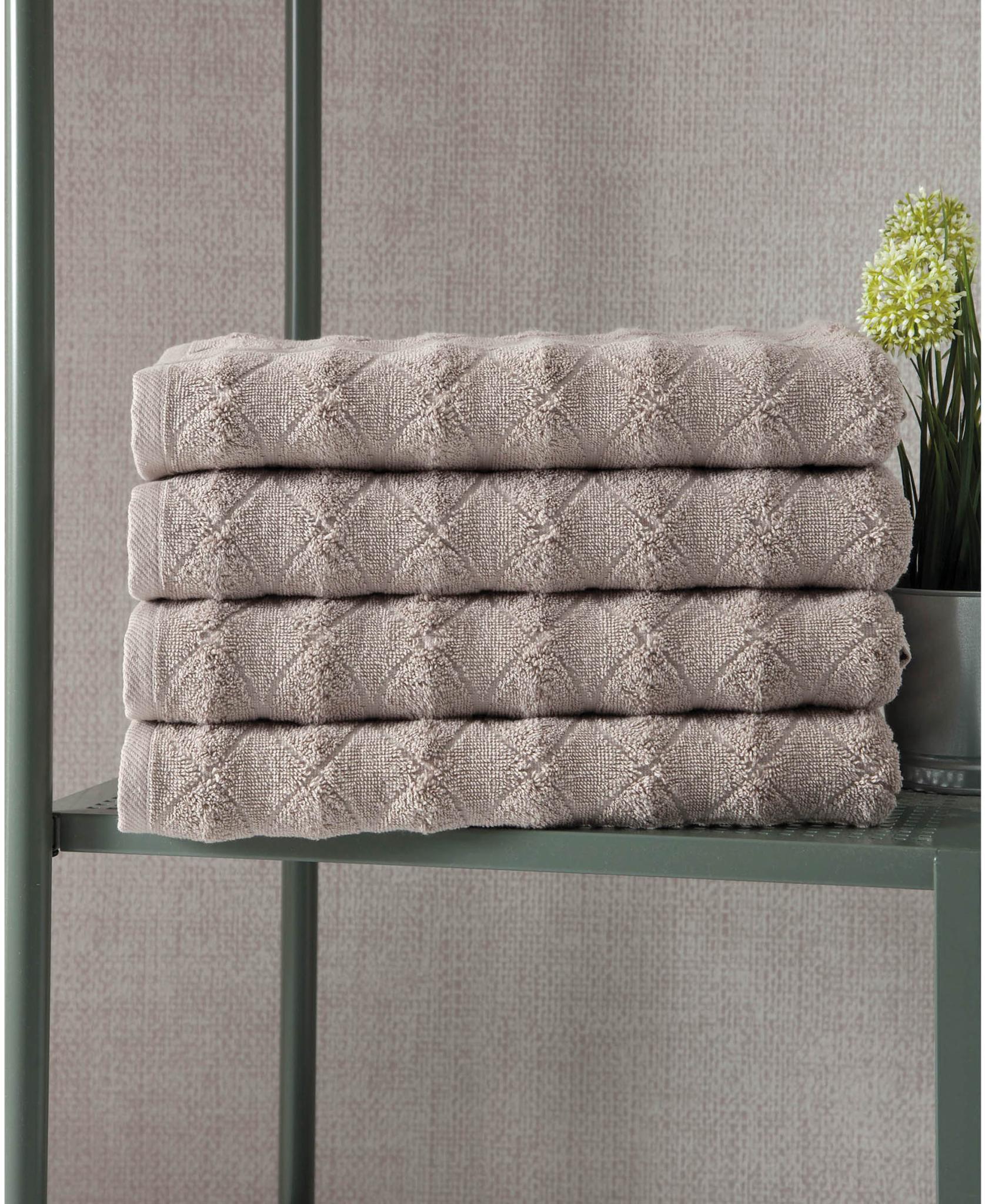 Set of four taupe geometric Turkish cotton bath towels, 27 x 54 in, folded stack