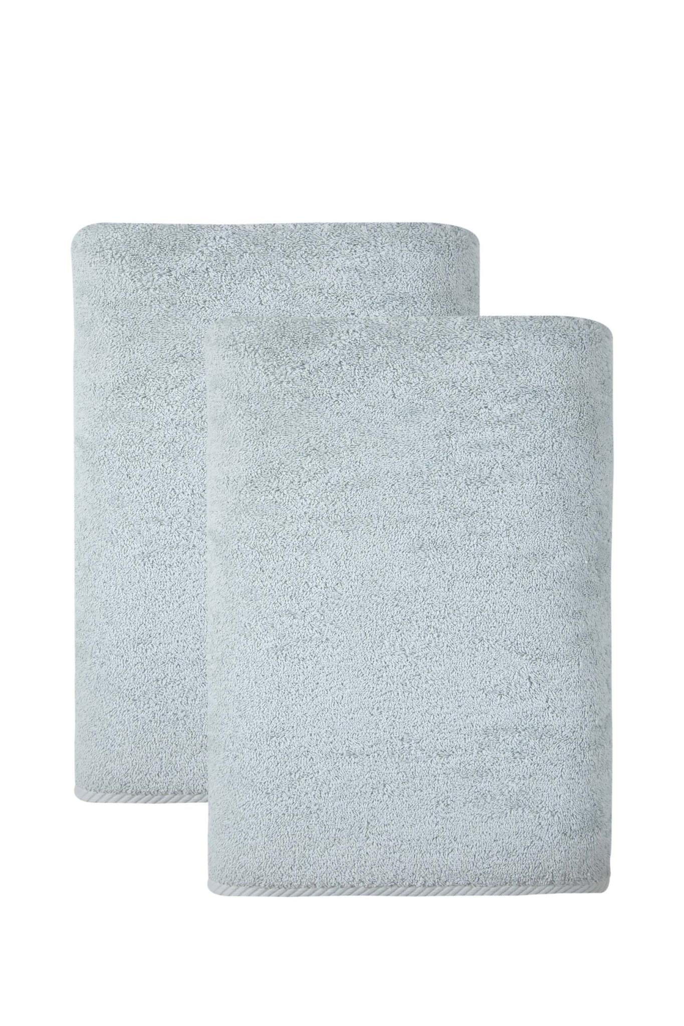 Set of two aqua Turkish cotton bath sheets, folded, soft terry texture