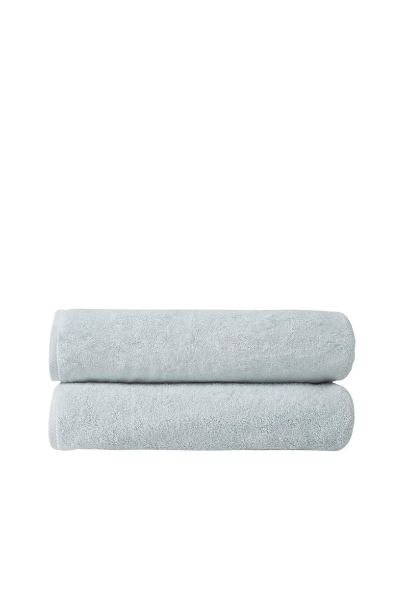 Set of two aqua Turkish cotton bath sheets, stacked and folded, terry texture