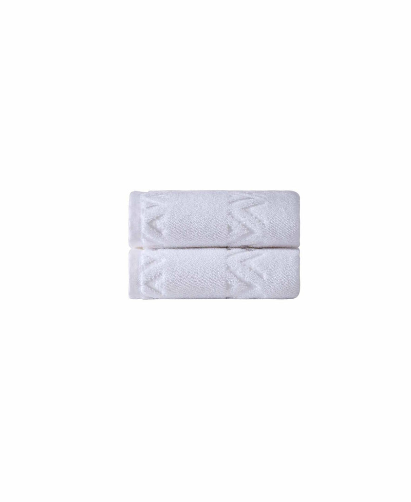 Set of two white hand towels folded together, geometric zigzag textured design