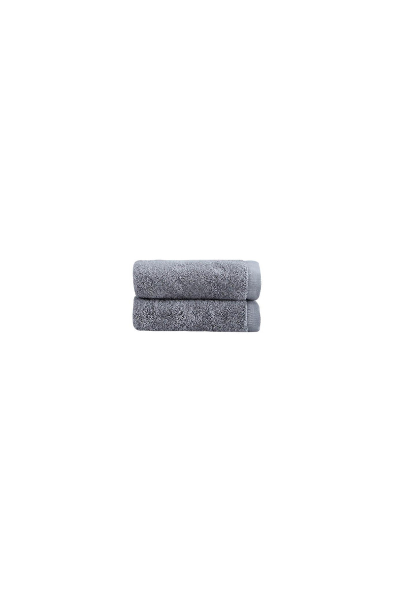 Light gray Turkish cotton hand towel, folded terry cloth stack