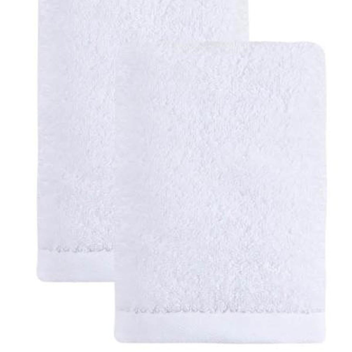 Set of two white Turkish cotton hand towels, 16x30 in, folded textured weave