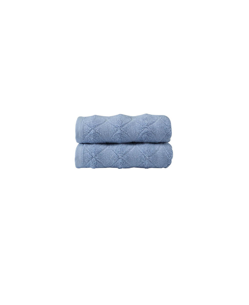Blue geometric Turkish cotton hand towel set, two folded towels stacked
