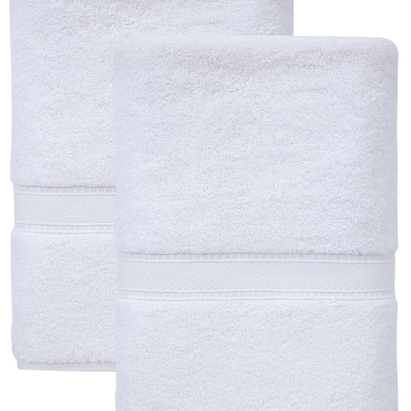 Set of two white Turkish cotton bath towels, layered folds with horizontal band detailing