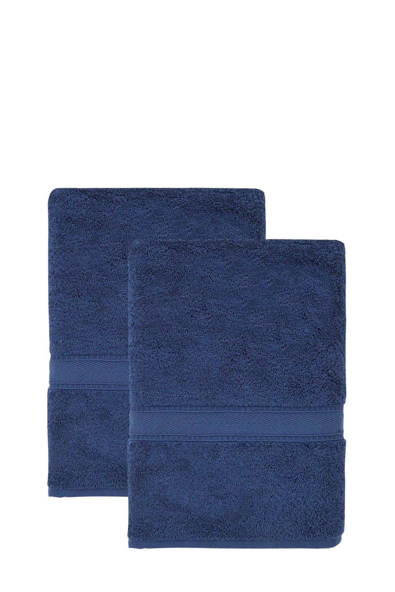 Set of two navy Turkish cotton bath towels stacked, terry pile, stitched edge