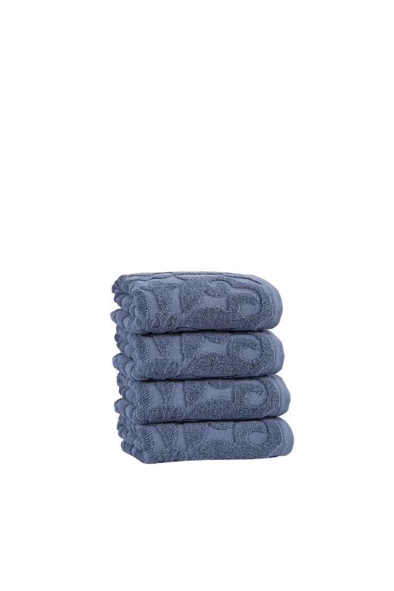 Blue Turkish cotton hand towels, floral pattern, compact stack, 16x30 in
